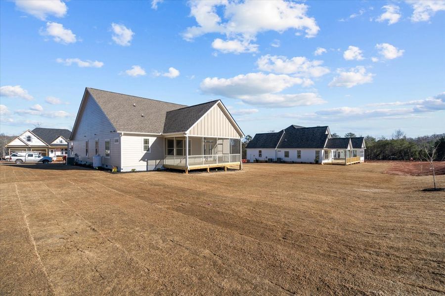 Representative exterior photo of a completed home built from the Caterina Elite by Enchanted Homes in Tubbs Mountain Estates, Travelers Rest, SC (Image 27).