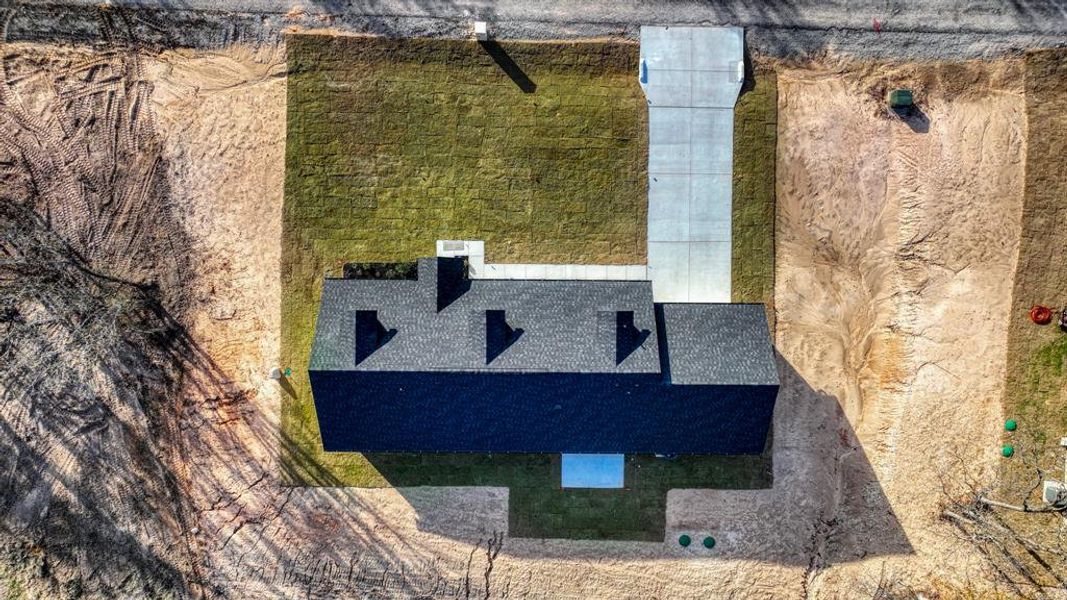 Exterior details and patio area of a home in , Poolville (Image 25).