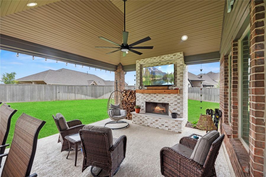 Outdoor living area with outdoor fireplace