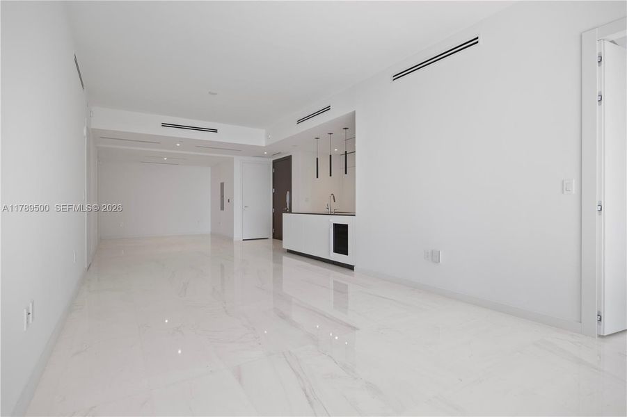 Spacious, unfurnished interior of a new home in Aston Martin Residences, Miami (Image 21).