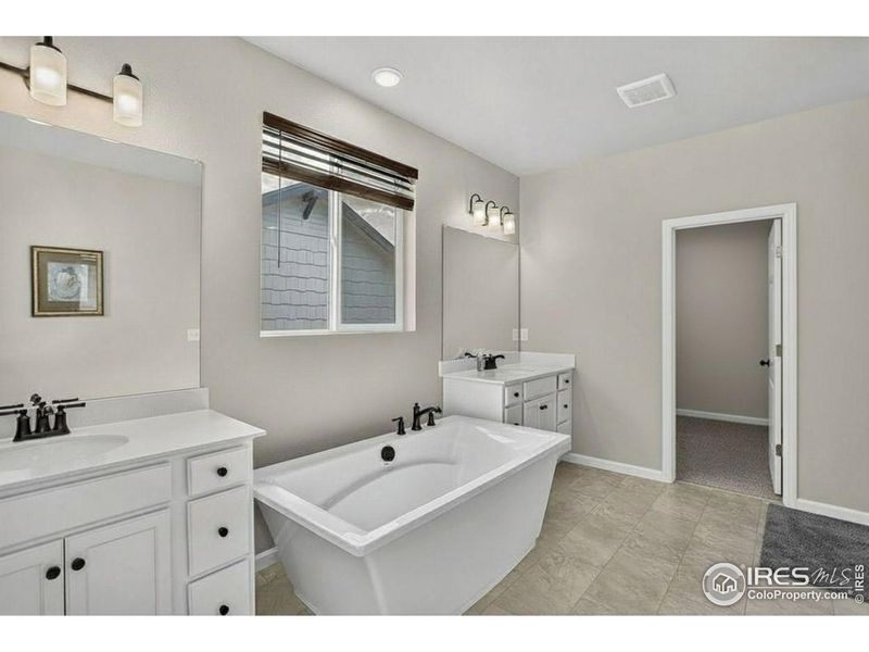 Furnished interior view inside a new home in Highlands Preserve, Mead (Image 24).