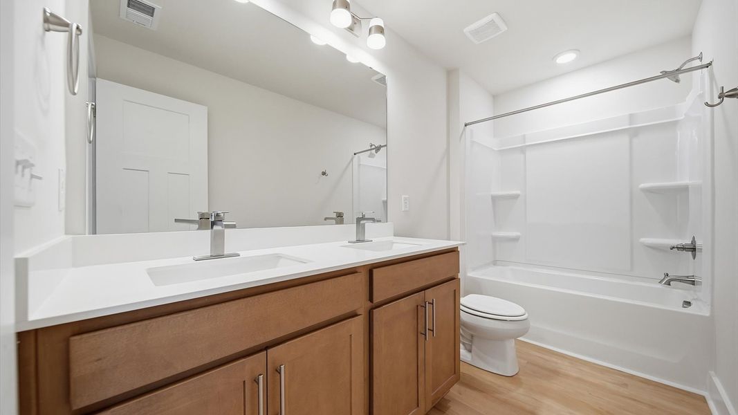 Top-notch bathroom with current fixtures, tasteful materials, and elevated charm Top-notch bathroom with current fixtures, tasteful materials, and elevated charm
