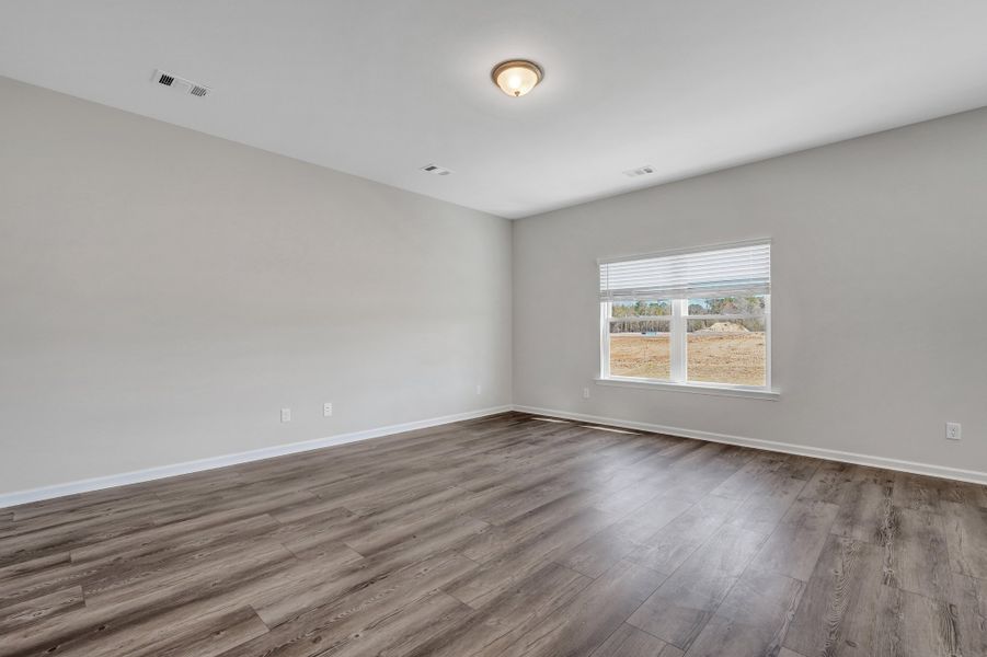 Representative unfurnished interior of a home built from the The Cypress by Smith Family Homes in Heritage at New Riverside, Bluffton (Image 16).