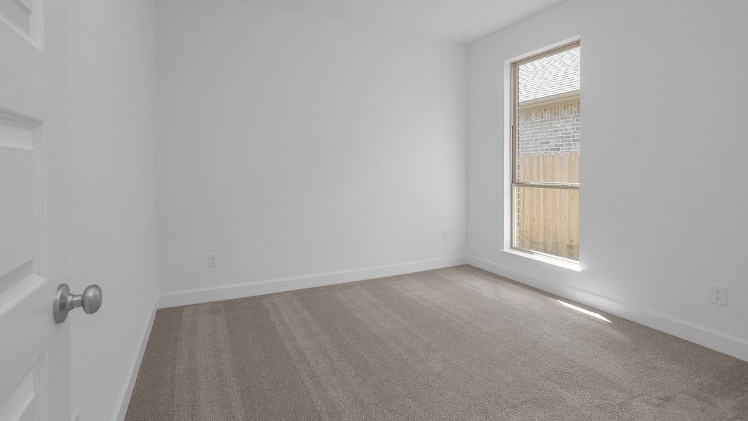 Spacious, unfurnished interior of a new home in Artavia 45', Conroe (Image 14).