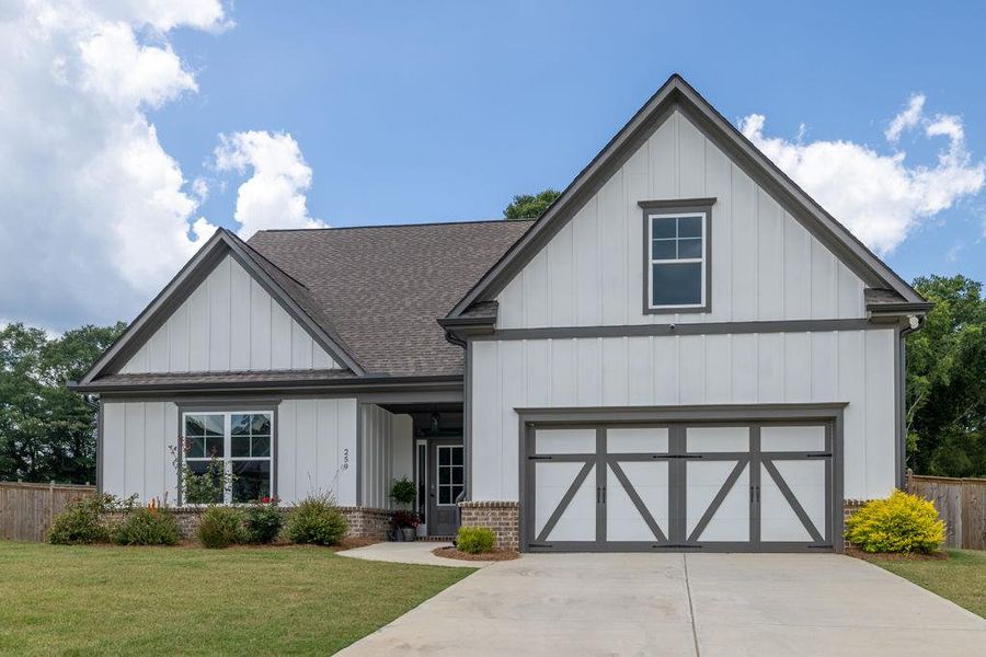 Front exterior of a new home in , Winder, GA, highlighting curb appeal (Image 1).