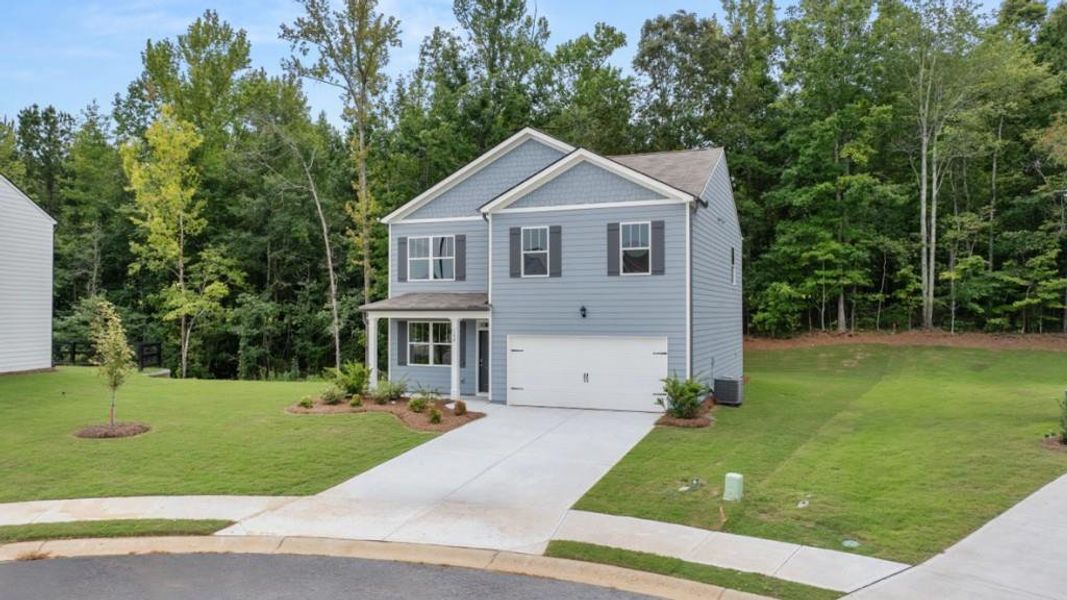 Front exterior of a new home in Oakleigh Glen, Dallas, GA, highlighting curb appeal (Image 2).