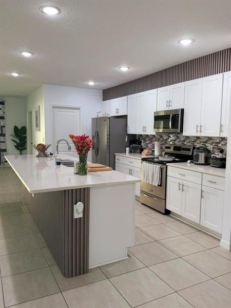 Furnished interior view inside a new home in , Kissimmee (Image 7).