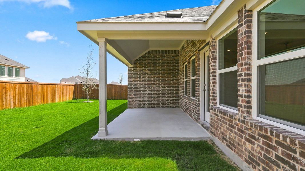 Exterior details and patio area of a home in Anna Ranch, Anna (Image 3).