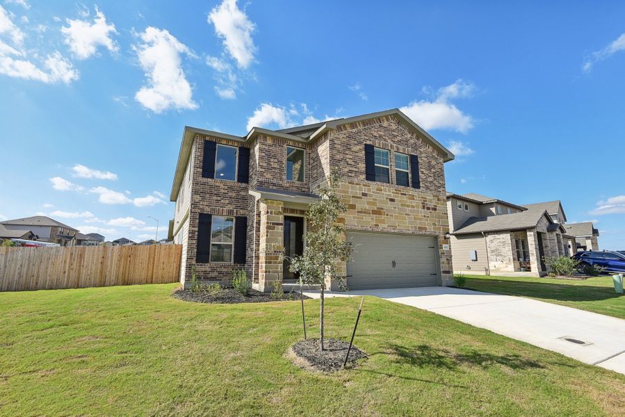 Front exterior of the Medina floorplan at a Meritage Homes community.