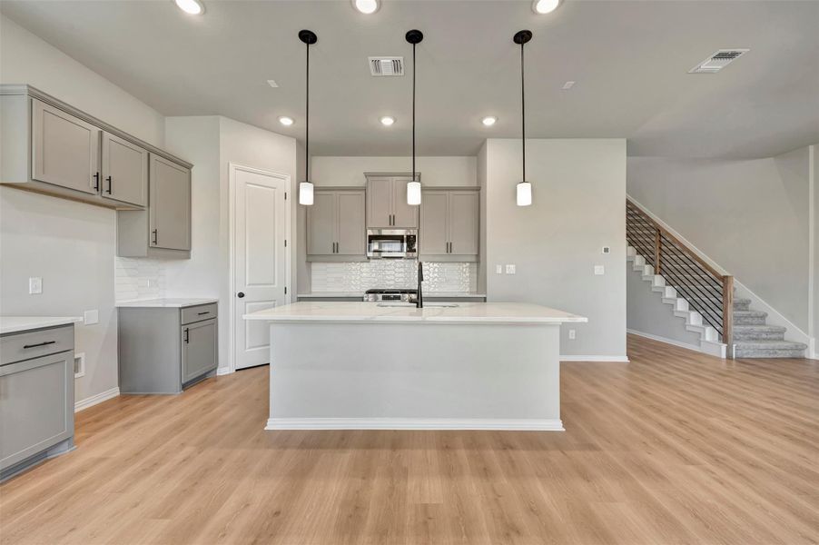 Furnished interior view inside a new home in Heritage, Dripping Springs (Image 8).