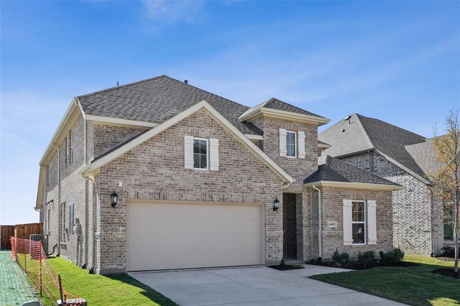 This beautiful, new brick home offers outstanding architectural details that create fantastic curb appeal!