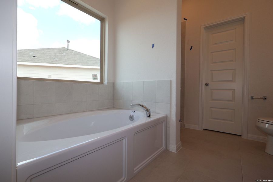 Furnished interior view inside a new home in Verano Farms, Von Ormy (Image 9).