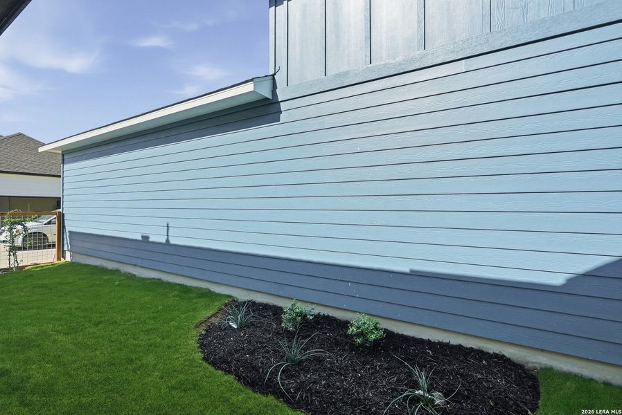 Exterior details and patio area of a home in The Crossvine, Schertz (Image 23).