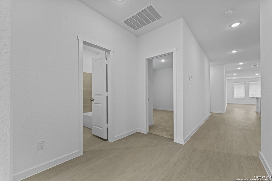 Spacious, unfurnished interior of a new home in Hidden Trails: Coastline Collection, Bulverde (Image 17).