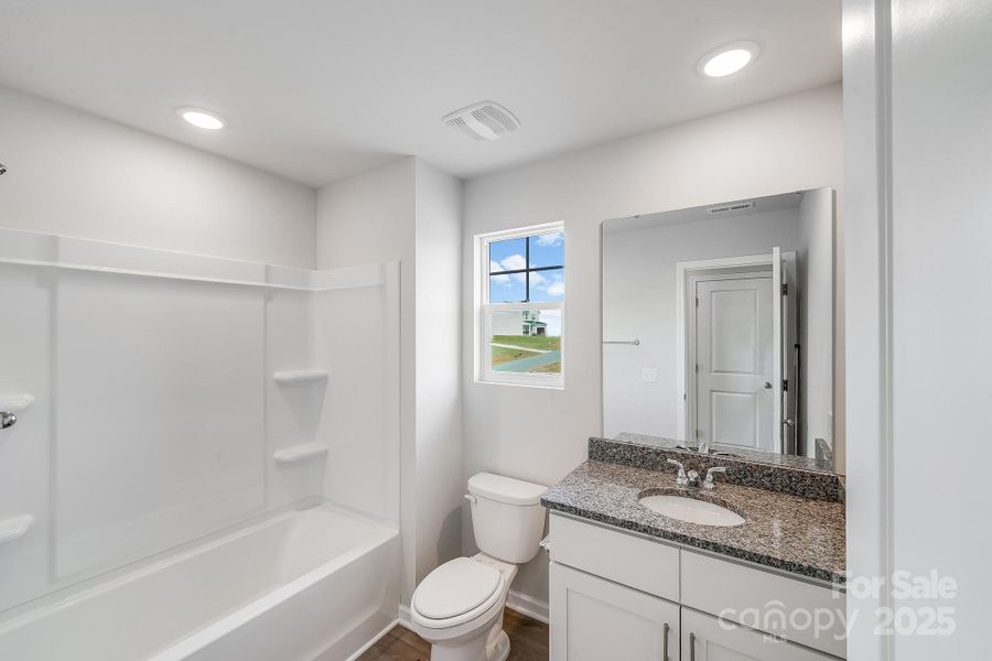 Furnished interior view inside a new home in , Statesville (Image 16).