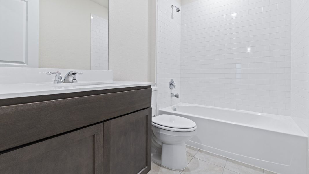 Representative furnished interior of a home built from the X40L Lakeway by D.R. Horton in Valor Farms, Royse City (Image 5).