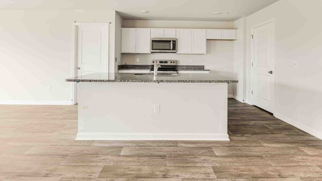 Furnished interior view inside a new home in Cedar Hill Landing, Navassa (Image 9).