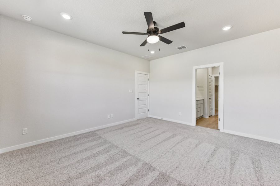 A room with a ceiling fan and a ceiling fan.