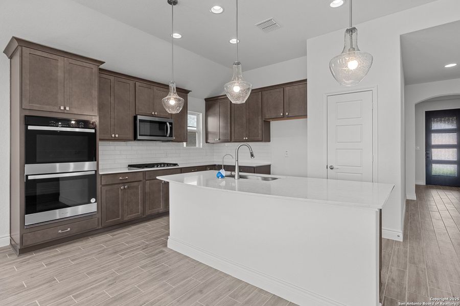 Furnished interior view inside a new home in Bison Ridge, San Antonio (Image 11).