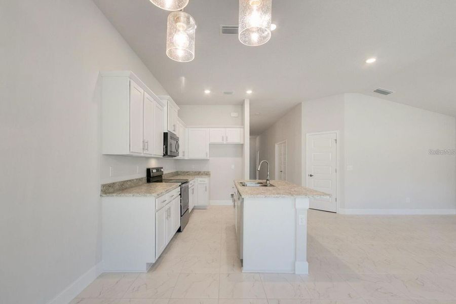 Furnished interior view inside a new home in Ocala Crossings South, Ocala (Image 4).