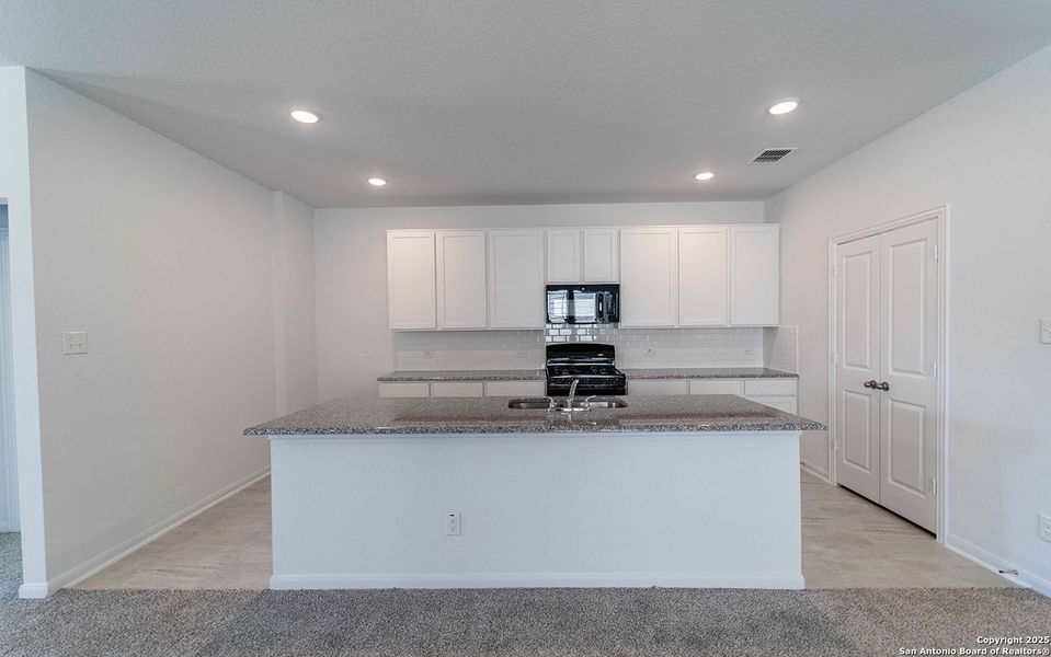 Furnished interior view inside a new home in Red Hawk Landing, San Antonio (Image 2).