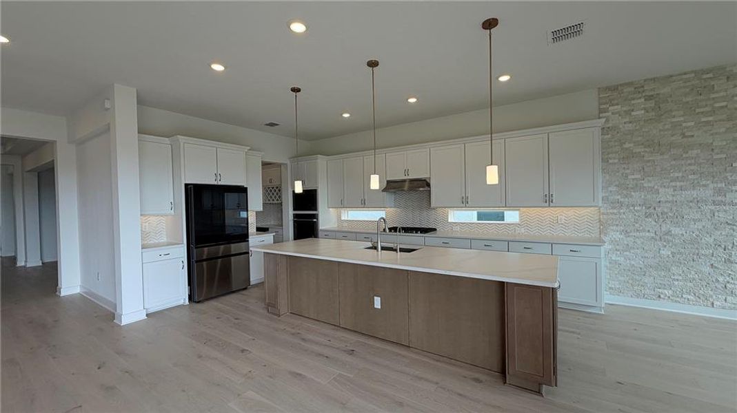 Furnished interior view inside a new home in Willow Ridge, Montverde (Image 9).