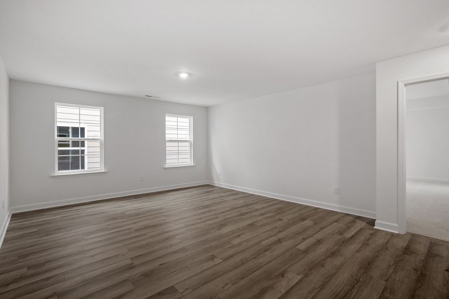 Spacious, unfurnished interior of a new home in Georgias Landing, Raleigh (Image 32).