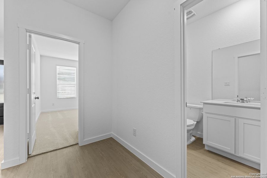 Spacious, unfurnished interior of a new home in Hidden Trails: Coastline Collection, Bulverde (Image 22).