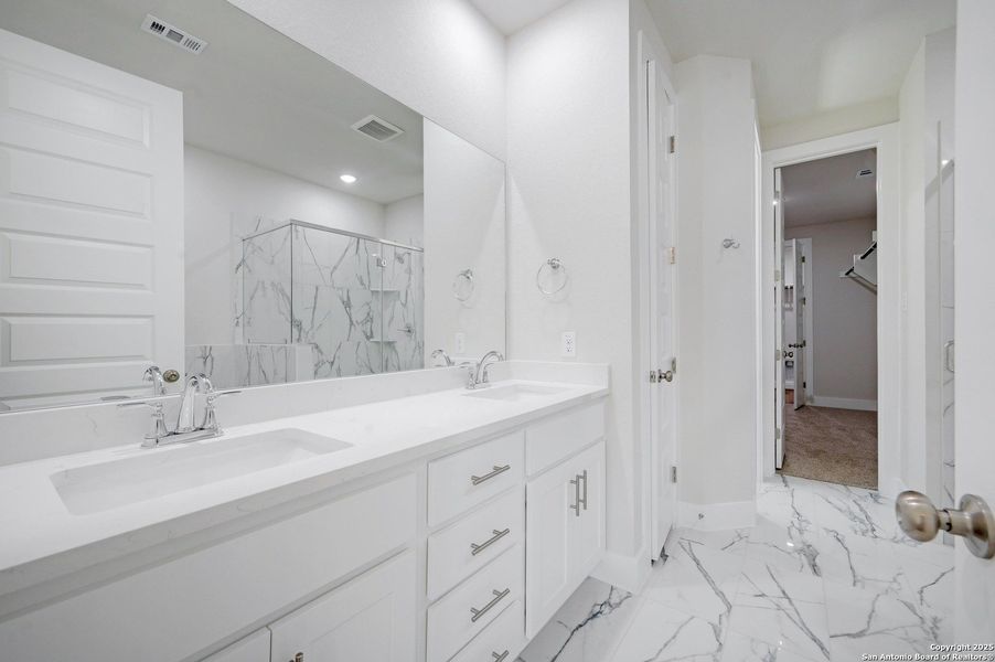 Furnished interior view inside a new home in Crown Ridge Manor, San Antonio (Image 9).
