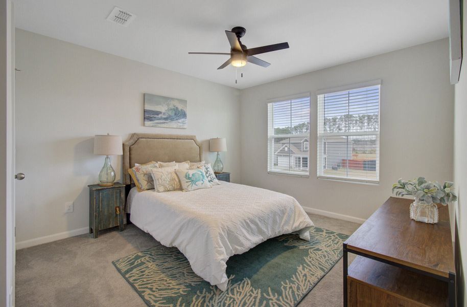 Furnished interior view inside a new home in Sanctuary Cove at Cane Bay, Summerville (Image 48).