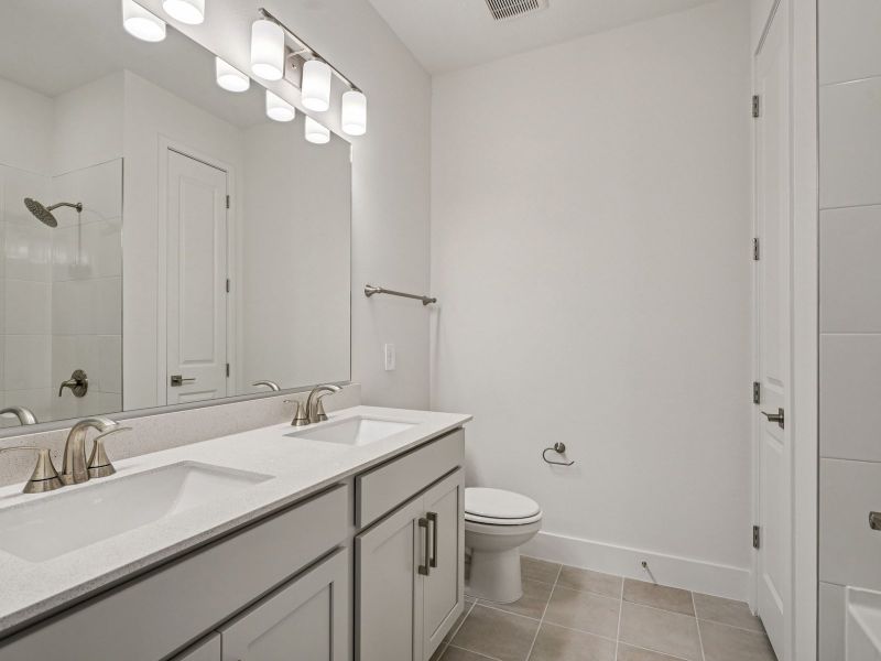 Furnished interior view inside a new home in Ridgehaven - Signature Series, Ormond Beach (Image 6).