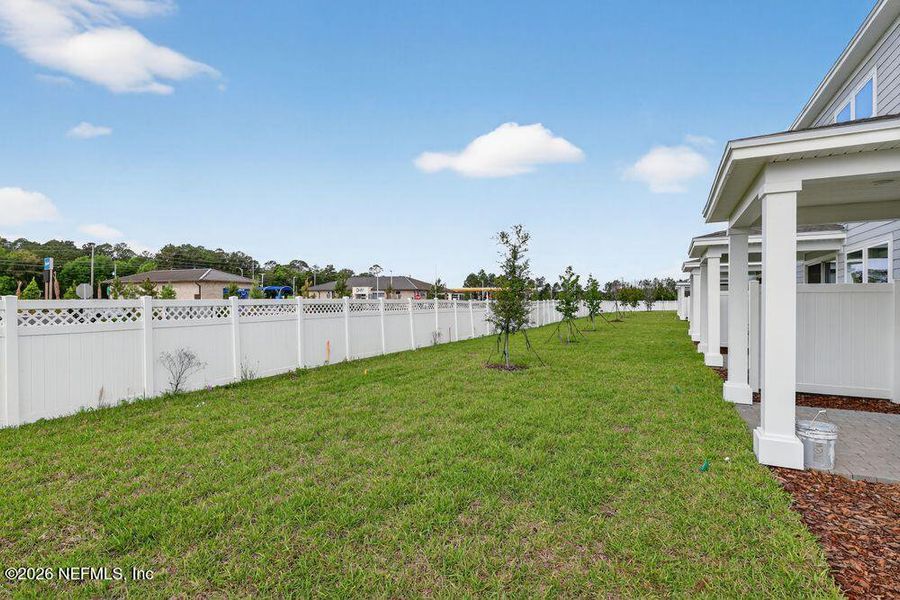 Exterior details and patio area of a home in Cherry Elm at SilverLeaf, St. Augustine (Image 4).
