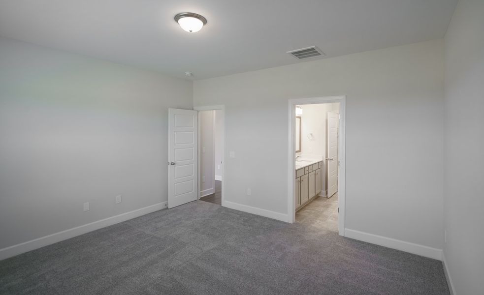 Representative unfurnished interior of a home built from the The Harper by Cothran Homes in Holly Ridge, Greenville (Image 23).
