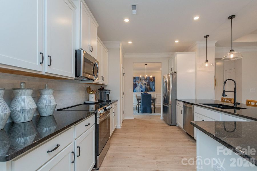 Furnished interior view inside a new home in Pine Bluff, Midland (Image 27).