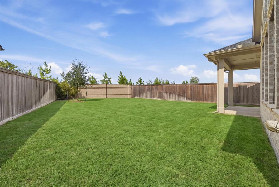 Exterior details and patio area of a home in Bridgeland 45', 50', 70', Cypress (Image 4). Exterior details and patio area of a home in Bridgeland 45', 50', 70', Cypress (Image 4).