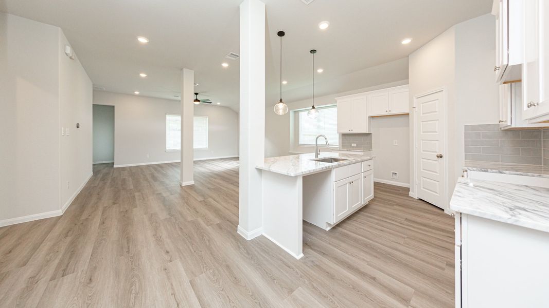 Kitchen to Dining Area and Family Room
