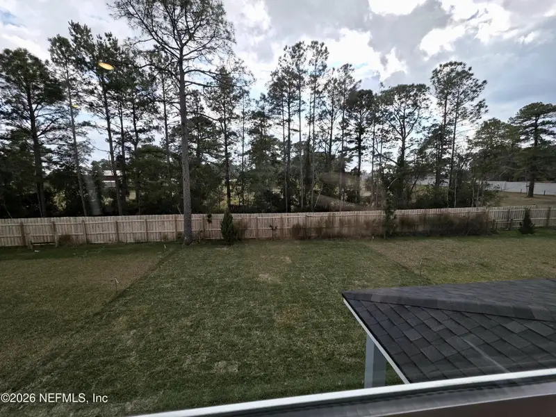 Exterior details and patio area of a home in Hyland Trail, Green Cove Springs (Image 3).