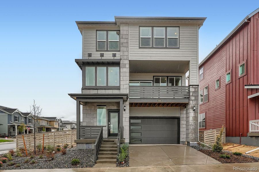 Exterior details and patio area of a home in Sterling Ranch: The Skyline Collection, Littleton (Image 2).