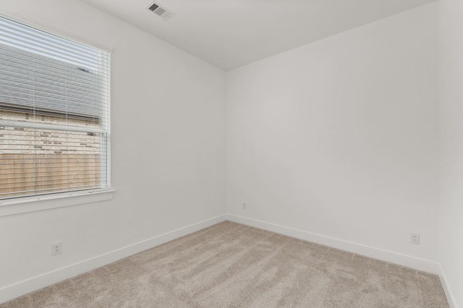 Representative unfurnished interior of a home built from the Rowen by Chesmar Homes in Brookewater 45's, Rosenberg (Image 29).