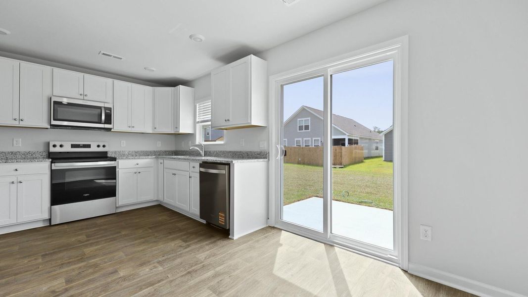 Furnished interior view inside a new home in Center Pointe, Santee (Image 5).