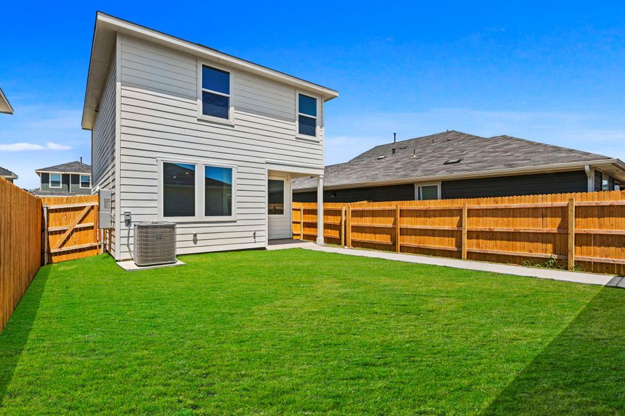 Exterior details and patio area of a home in Valverde, Bastrop (Image 3).