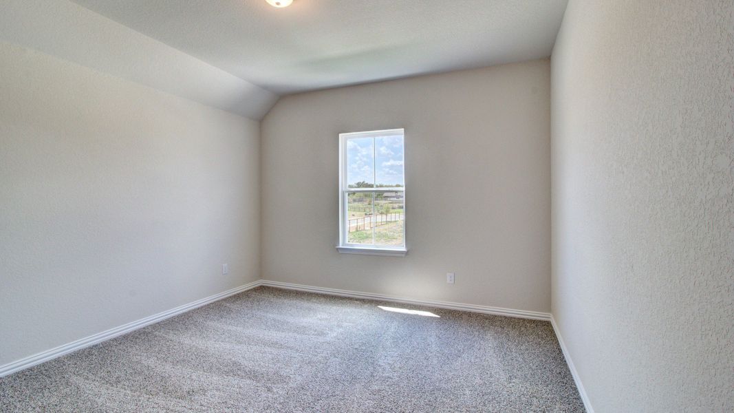 Furnished interior view inside a new home in The Crossvine, Schertz (Image 26).