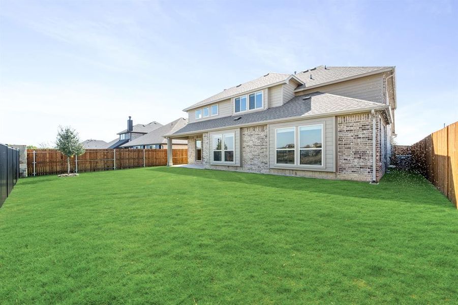 Exterior details and patio area of a home in Timberbrook 3B-4A, Justin (Image 4). Exterior details and patio area of a home in Timberbrook 3B-4A, Justin (Image 4).