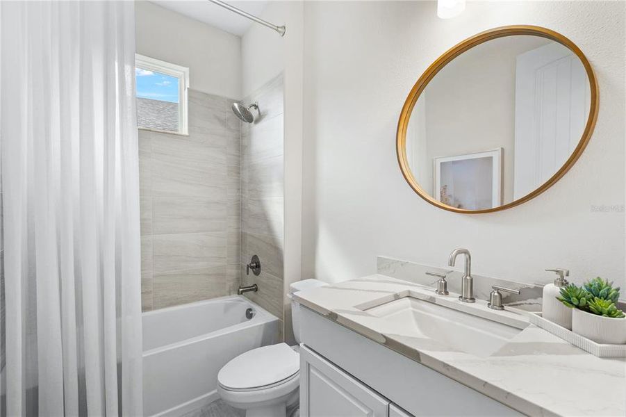 Furnished interior view inside a new home in North River Ranch -  Longmeadow, Parrish (Image 4).