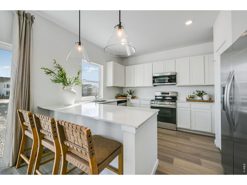 Furnished interior view inside a new home in Kinston, Loveland (Image 9).