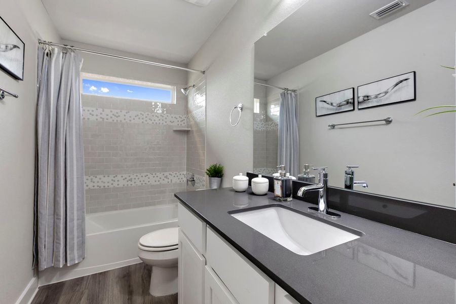 Furnished interior view inside a new home in Village at Manor Commons, Manor (Image 12).