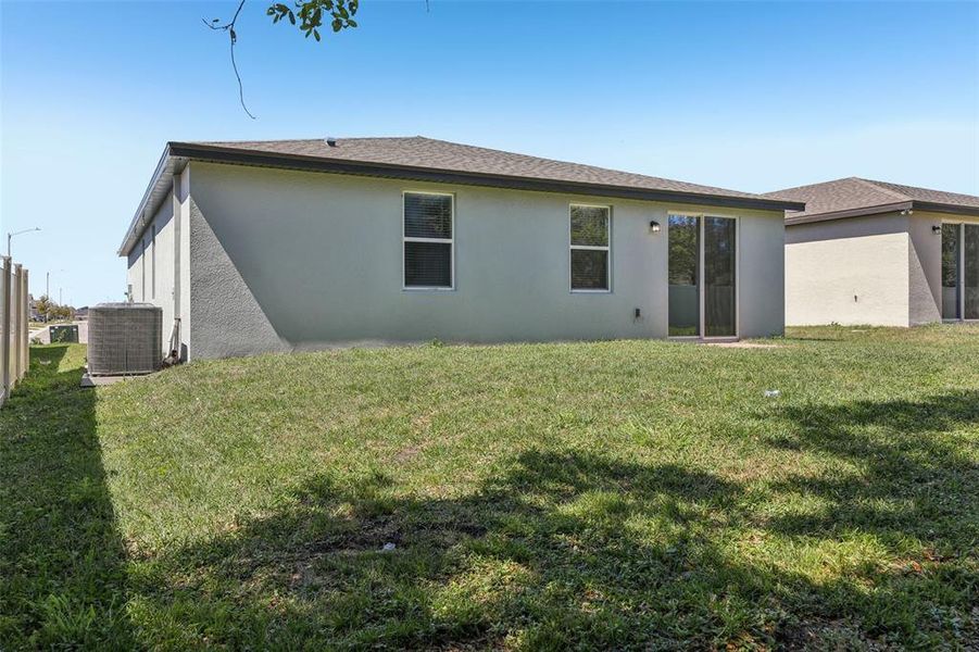 Exterior details and patio area of a home in Lawson Dunes - Signature Series, Haines City (Image 2).