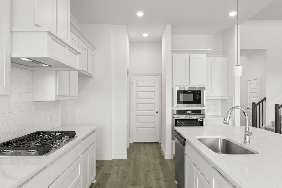Furnished interior view inside a new home in Park Trails, Forney (Image 12).