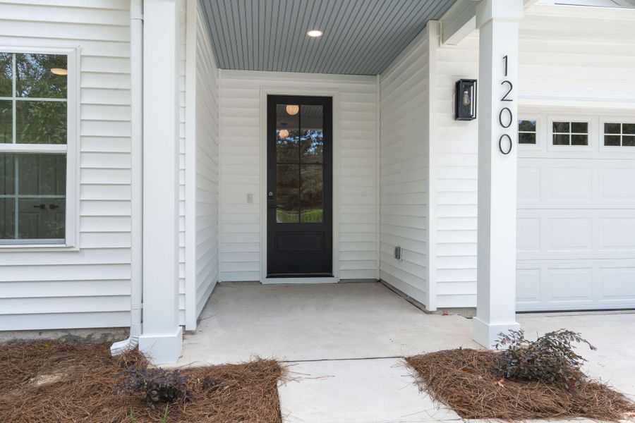 Front exterior of a new home in , Moncks Corner, SC, highlighting curb appeal (Image 21).