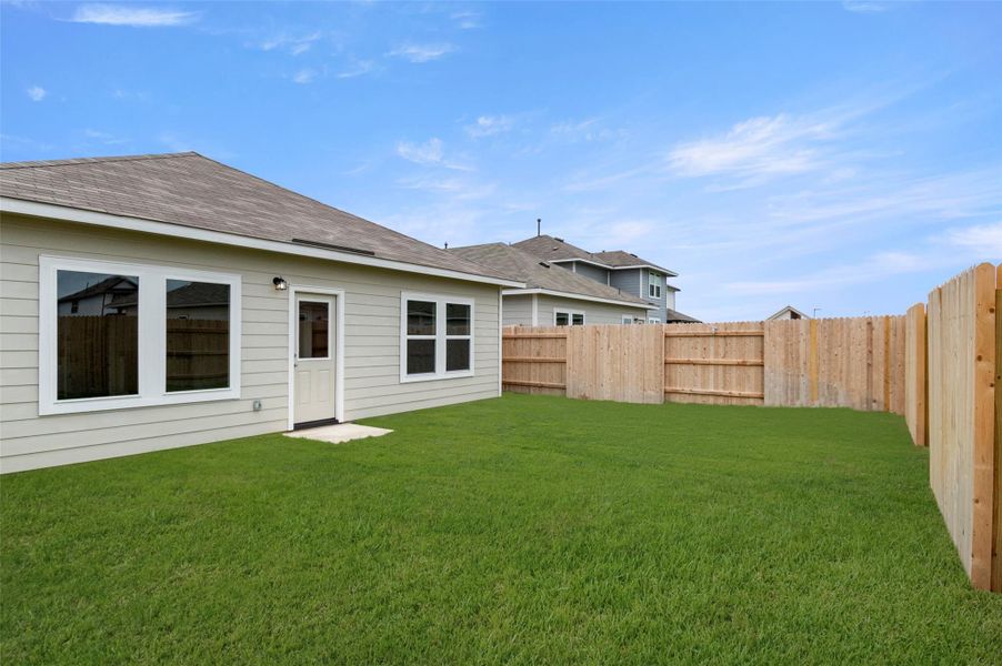 View of fenced backyard